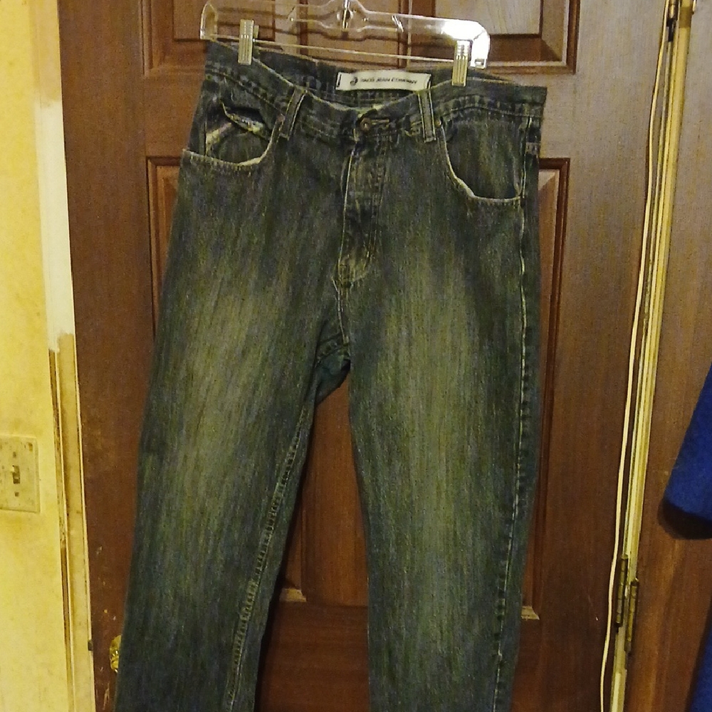 Relaxed Blue Jeans with Whiskering and Distressing